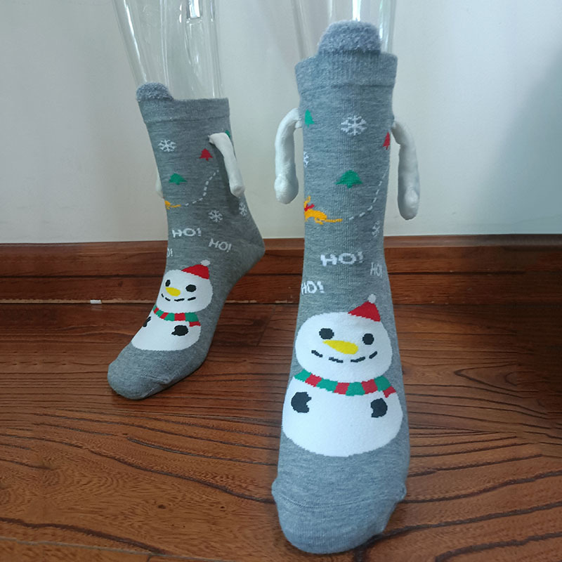 手をつないで靴下のカップルの磁気は取っ手を吸ってかわいいです。|undefined