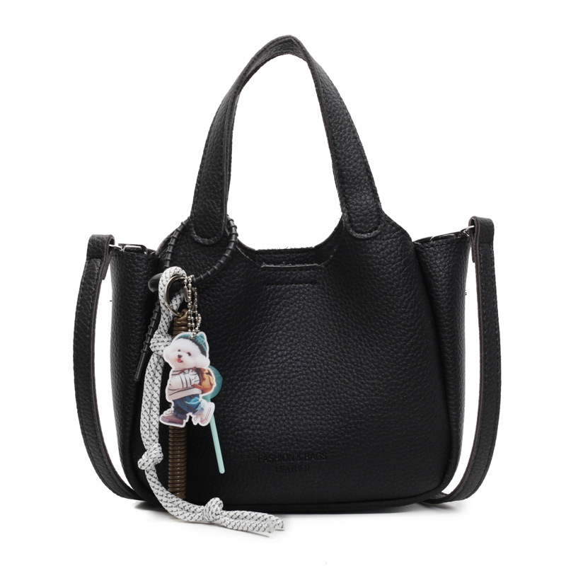 Bolso de cubo de mano transfronterizo sentido de alta gama para mujer 2025 nuevo bolso de mensajero de un solo hombro simple y versátil bolso de canasta de verduras de nicho