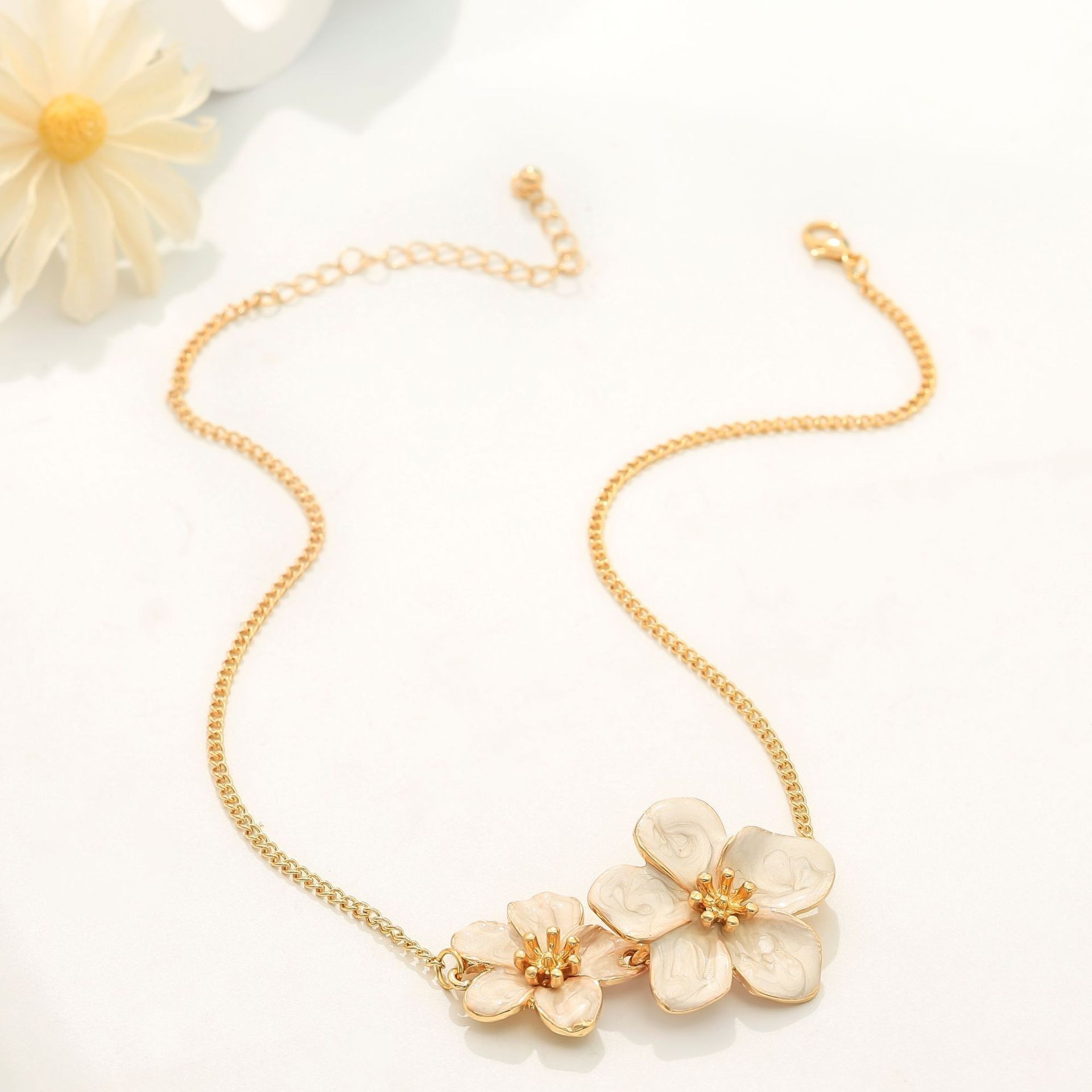 Europa y los Estados Unidos moda transfronteriza venta caliente flor simple personalidad universal mujer raqueta de calle conjunto de decoración joyas de moda