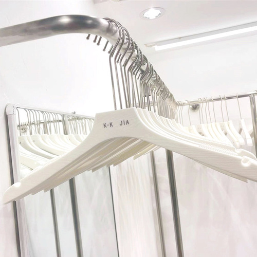 Free logo plastic clothes hanger for clothing store, imitation wood grain clothes hanger and trouser clip for adults, thickened, non-slip, traceless clothes support