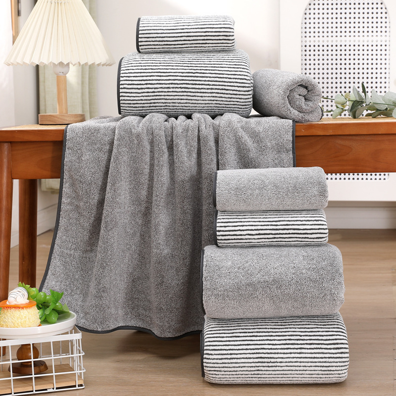Bamboo charcoal fiber towel and bath towel, thickened and enlarged, highly absorbent, soft, with bound edges, does not shed easily, skin-friendly, for home use, made of coral fleece Bamboo charcoal fiber towel and bath towel, thickened and enlarged, highly absorbent, soft, with bound edges, does not shed easily, skin-friendly, for home use, made of coral fleece