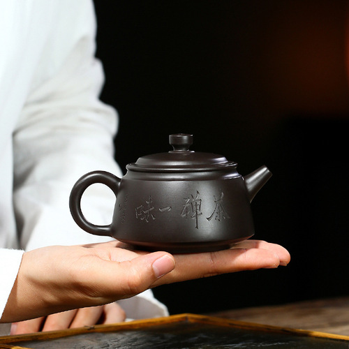 Yixing teapot wholesale new black mud tea Zen blind purple clay teapot famous artist carved tea set micro business delivery