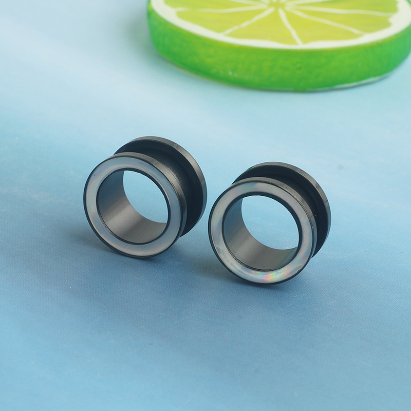 Silver pointed spike labret stud material detail