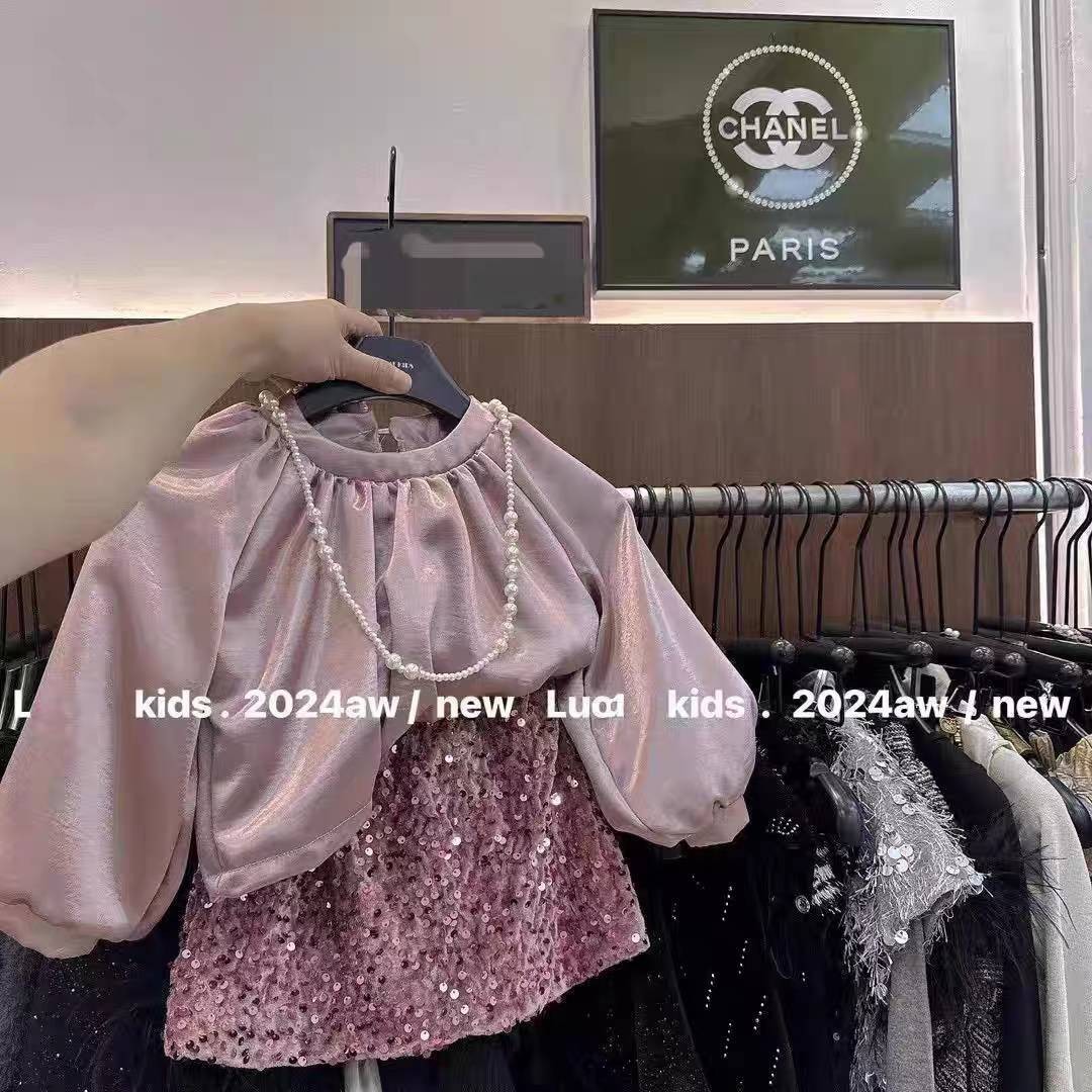 Niños estrella redonda falda de niña 2024 otoño y invierno ropa coreana de color sólido extranjero falda de cinturón para bebés con una falda corta gruesa de lana