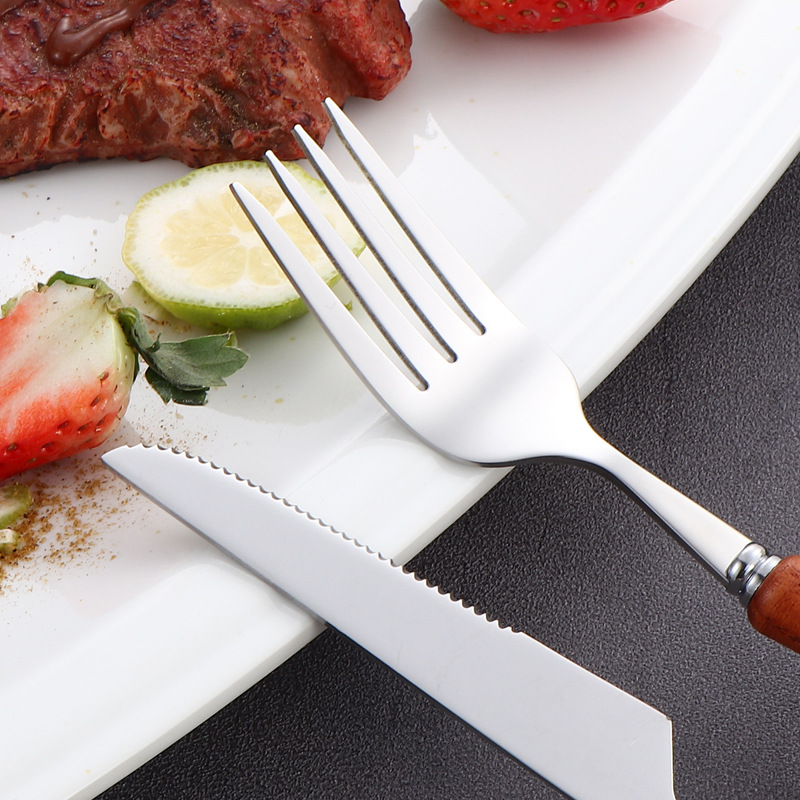 Cross-border 304 cuchillos y tenedores de acero inoxidable conjuntos de cubiertos creativos mangos de madera de mango redondo cubiertos de carne cuchillos y tenedores cucharas de té