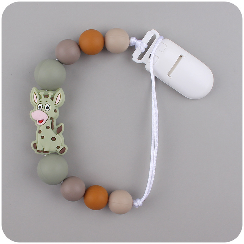 Nuevo bebé suministros chupete cadena creativa de dibujos animados jirafa silicona bebé mordedura cadena anti-caída molar