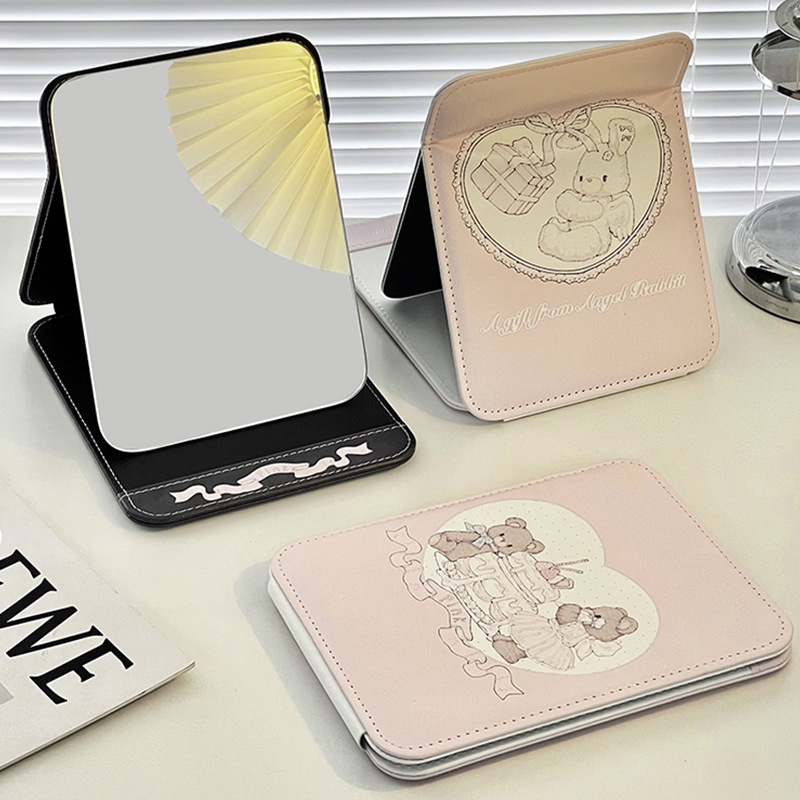 Original espejo de maquillaje de conejo espejo plegable Escritorio de escritorio portátil simple HD dormitorio princesa vestidor