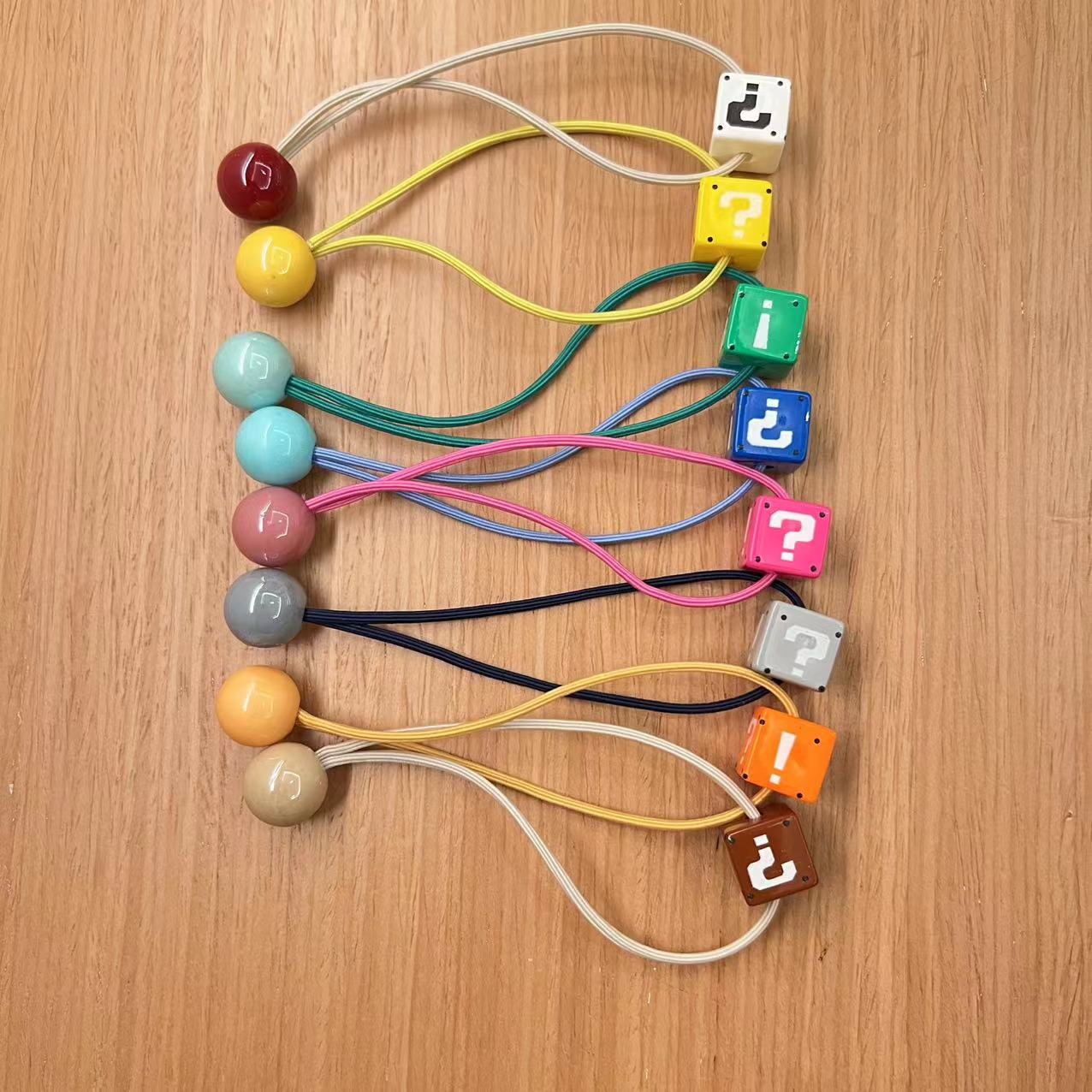 Yiwu venta al por mayor cuerda de pelo de doble cabeza para niños cuerda de pelo negro Yiwu agente de compra