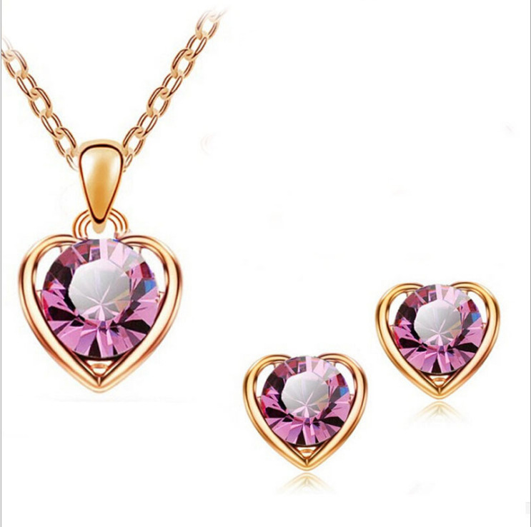 Directo de fábrica al por mayor en stock moda cristal Corazón en forma de corazón collar pendientes anillo pulsera conjunto de cuatro piezas