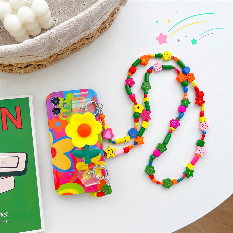 Pequeña flor amarilla correa de muñeca adecuada para iphone14promax apple 13 teléfono móvil shell crossbody cordón 12 silicona hembra 15 marea