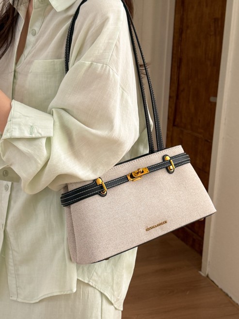 Textura de lino simple versátil alta sensación bolso de hombro de nicho para mujeres de diseño de viaje al trabajo bolsa de ocio