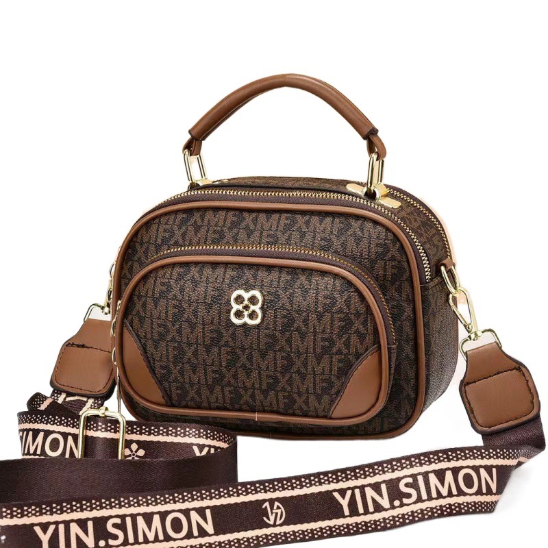 Bolso de mano de mujer Taizhou bolso de mujer estilo coreano impresión de moda bolsos redondos simple atmósfera bolsos de hombro
