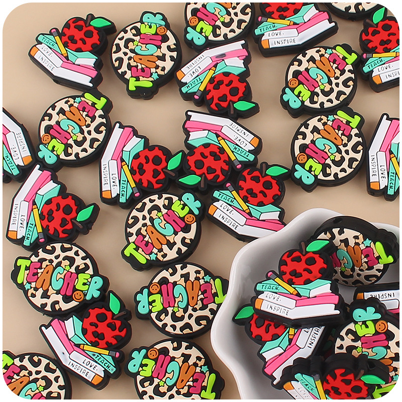 Nueva historieta infantil profesor libro Apple pequeño mordedor creativo DIY bebé molar pezón cadena pequeños accesorios