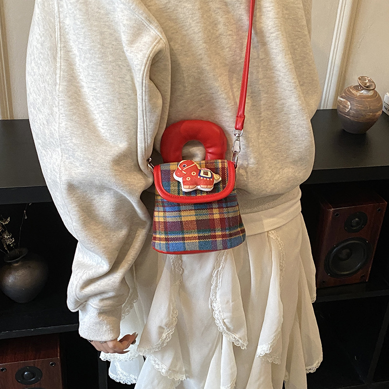Bolsa de mano de niña a cuadrillas de estilo extranjero, bolsa de hombro de bebé de dibujos animados lindo pony 2026 nuevo bolso de accesorios para niños