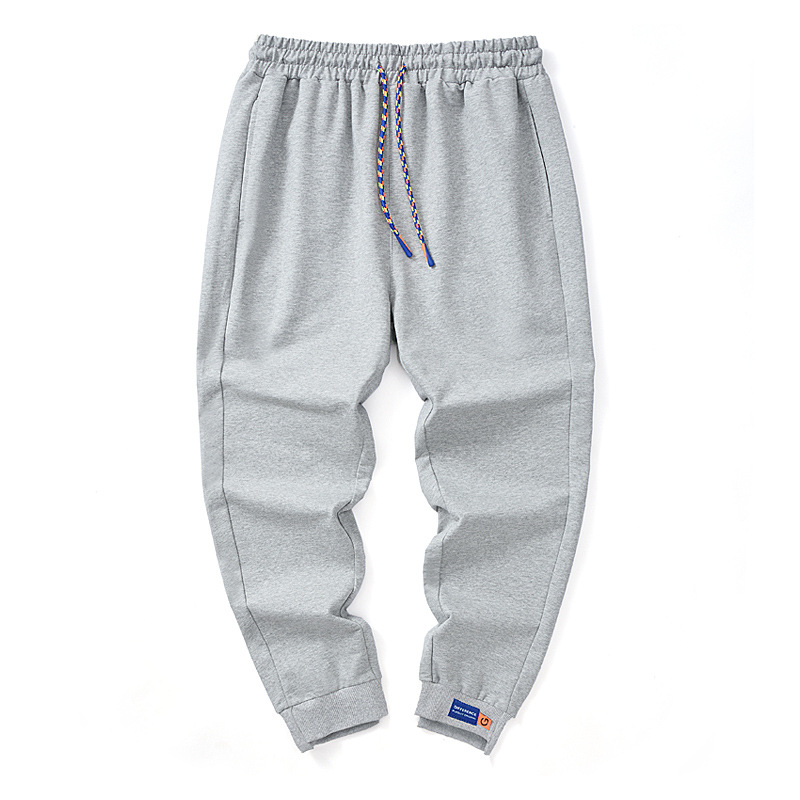 Pantalones de estilo de Hong Kong Pantalones deportivos de alta calidad para hombres pantalones de chándal de color sólido de punto pantalones casuales para hombres