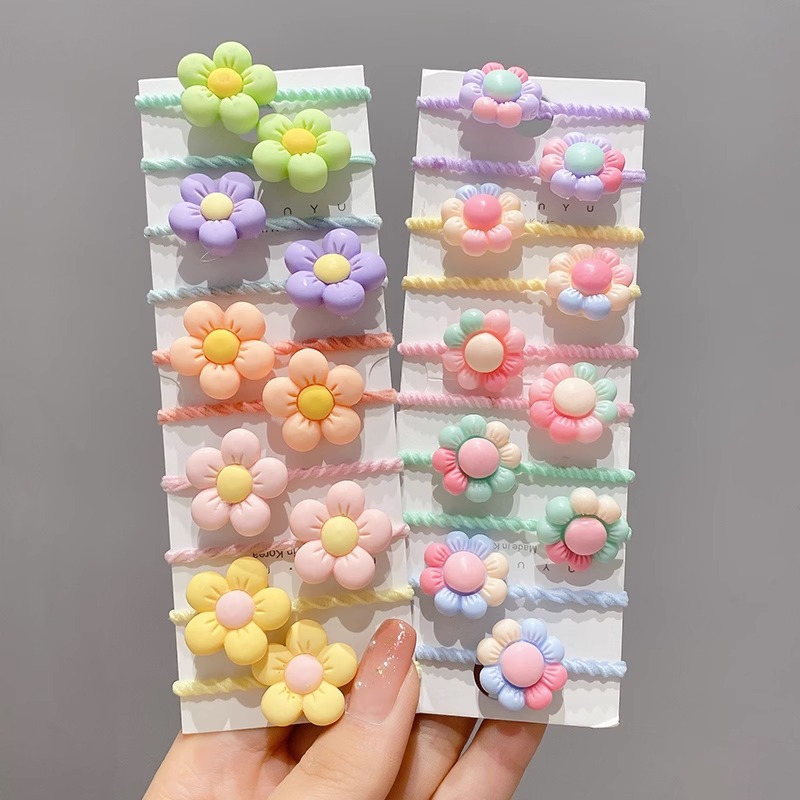 La cuerda del pelo del bebé de las muchachas de la banda de goma de los niños no lastima el pelo Los accesorios del pelo del pulgar del tamaño pequeño atan la banda de goma del pelo