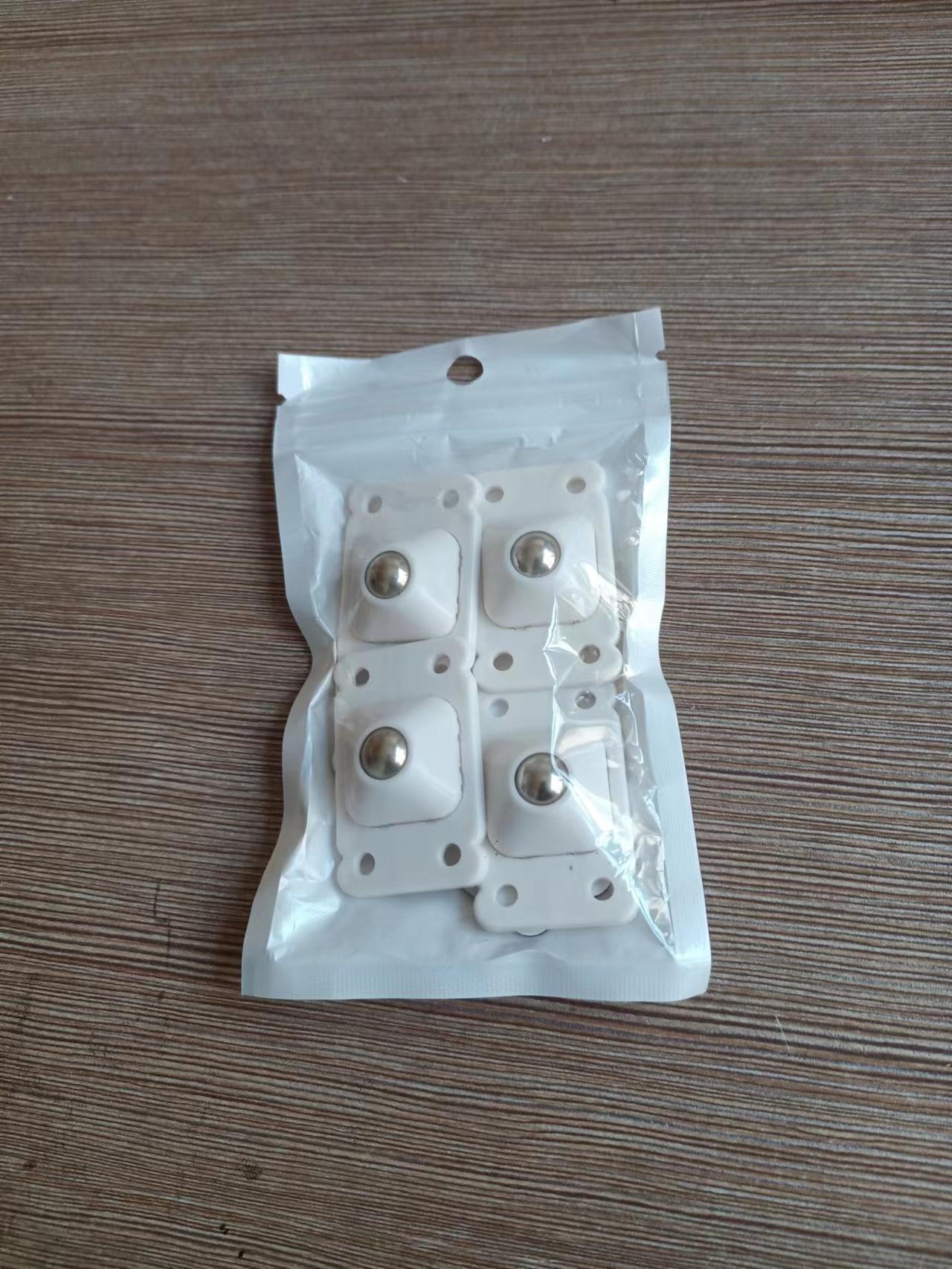 Plástico universal rueda de almacenamiento rack pequeña rueda deslizante caja de almacenamiento rodillo adhesivo pequeña polea fábrica al por mayor