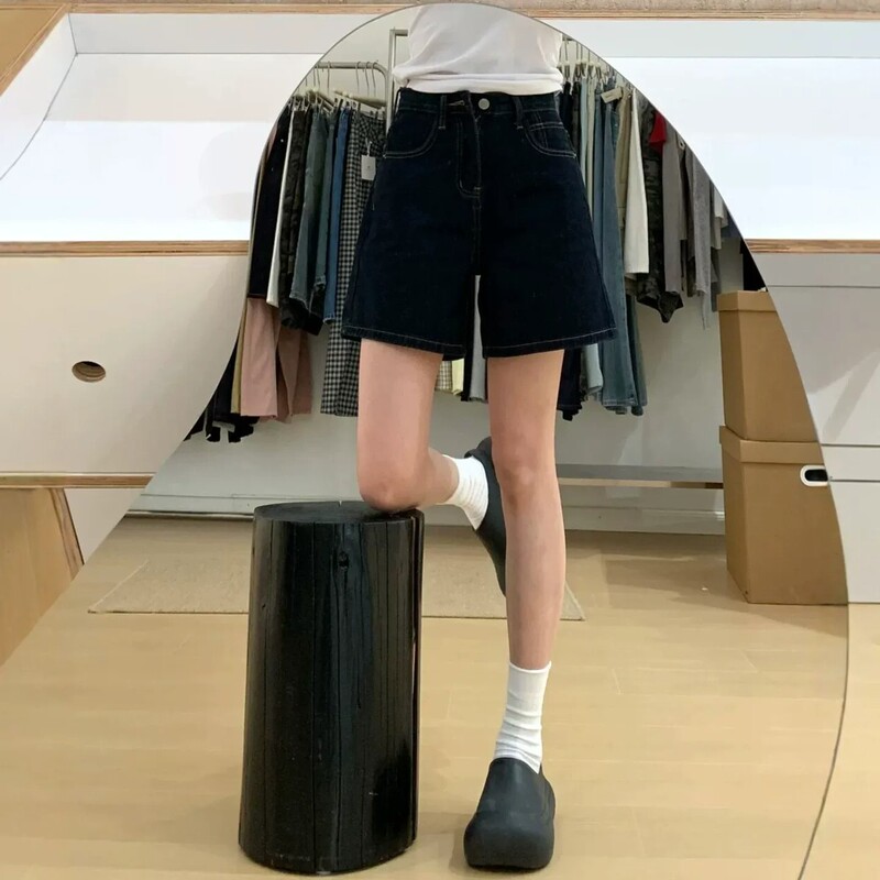 Simple American high street style dark blue wide-leg slimming and height-enhancing denim shorts for tall individuals, suitable for spring and summer