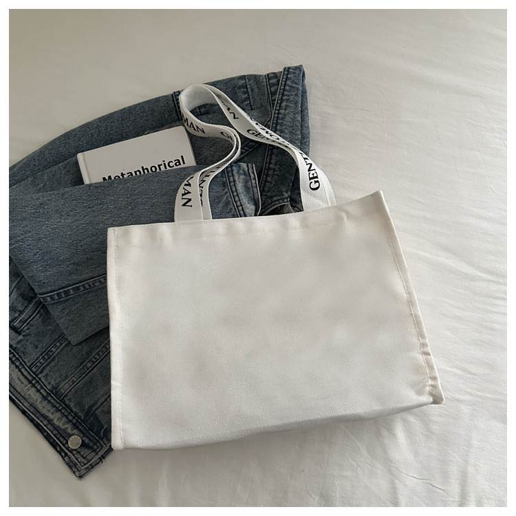 Large-capacity letter canvas bag 2025 new style ins printed versatile shoulder bag for commuting and portable ladies' tote bag undefined