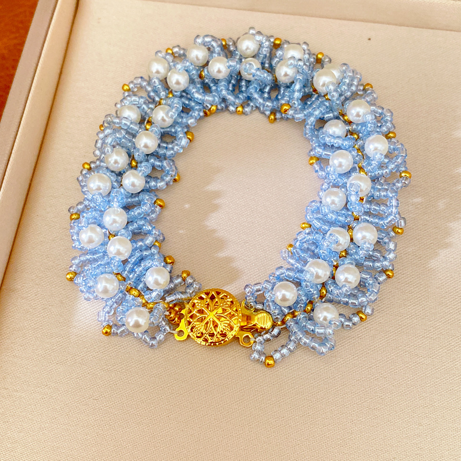 Accesorios de vacaciones pulseras de perlas ligeras de lujo nicho pulseras de alto nivel personalidad temperamento de moda joyas al por mayor