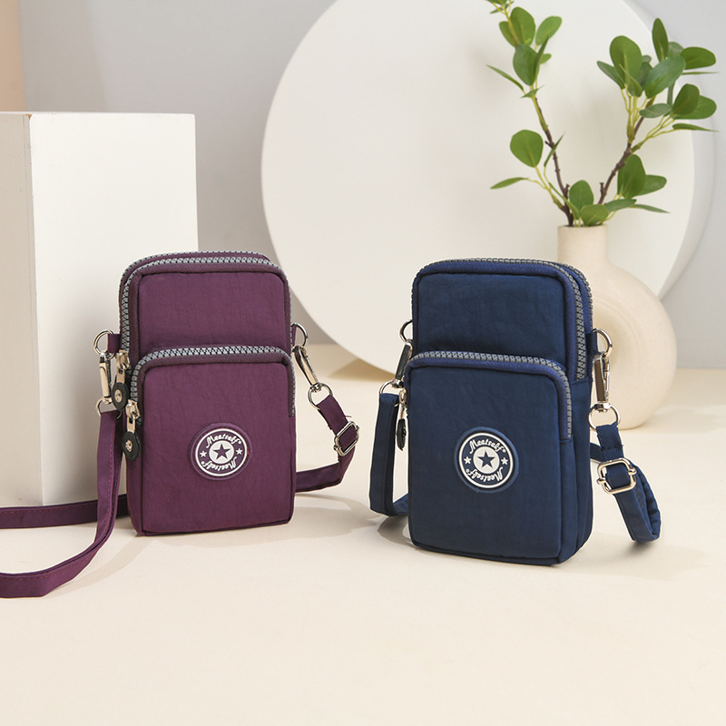 Fábrica directa para bolsos de teléfono móvil bolsos de mujer bolsos de pantalla grande bolsos de cambio bolsos de cuello bolsos de muñeca para correr mini vertical