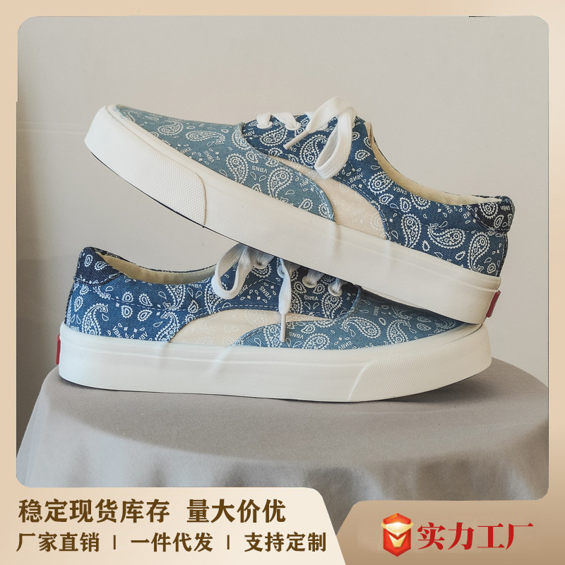 情侶板鞋男2024春季新款印花拼接帆布鞋男百搭低幫休閒鞋男鞋批發