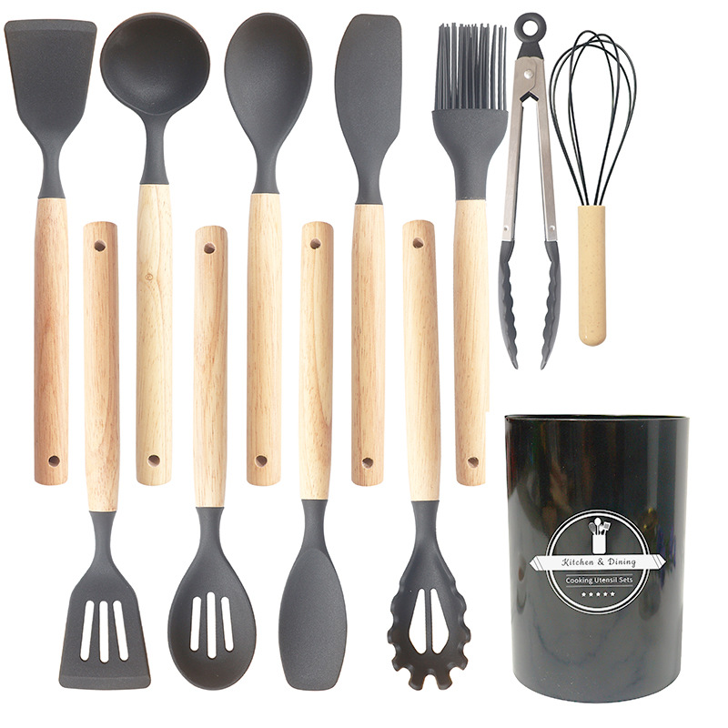 Utensilios de cocina de silicona transfronterizos 12 piezas sartén antiadherente pala de silicona de grado alimenticio espátula de silicona cuchara de sopa traje en stock al por mayor