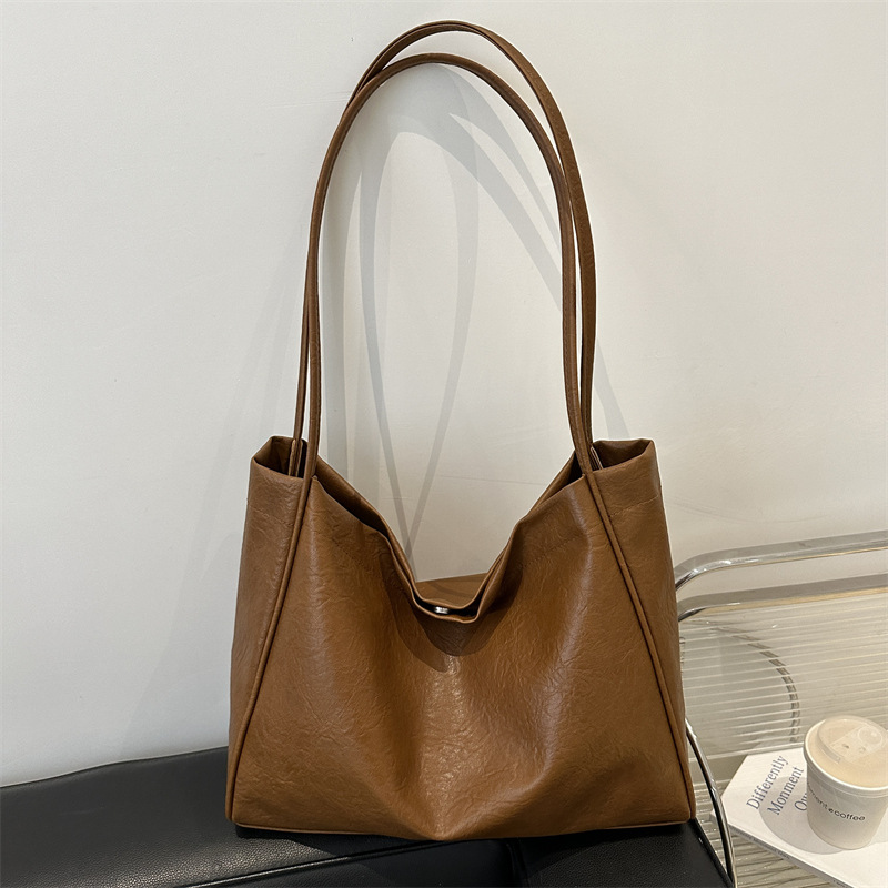 Bolsa de mano casual coreana para mujeres 2024 nueva moda de alta capacidad bolso de hombro de estilo minimalista bolso de mujer de viaje al trabajo