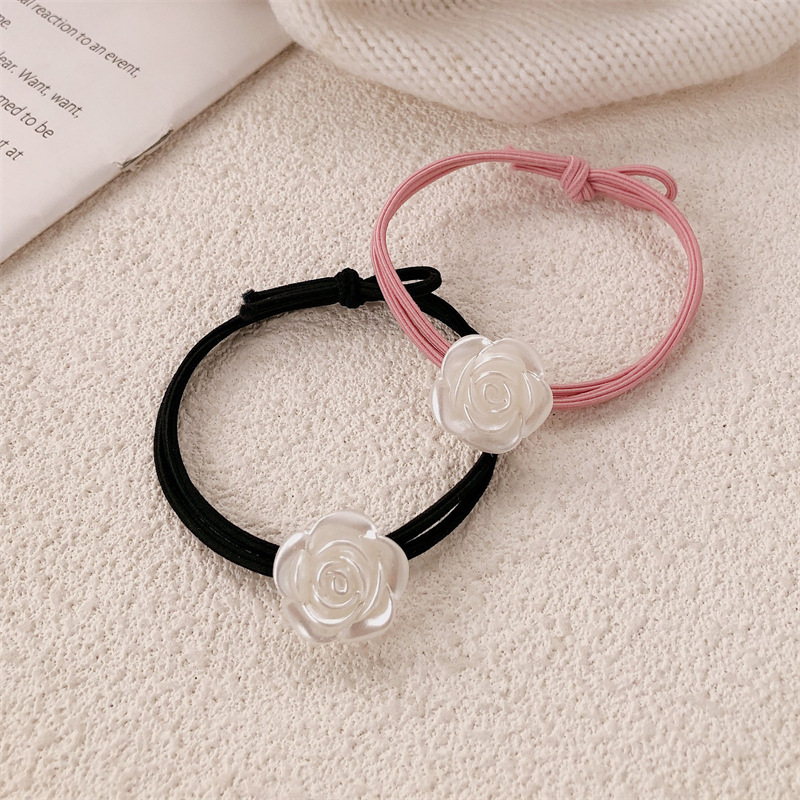 Versión coreana de la cuerda de la cabeza de la camelia accesorios para el cabello niña atar la cabeza temperamento de alta elasticidad rosa banda de goma anillo para el cabello cuerda para el cabello