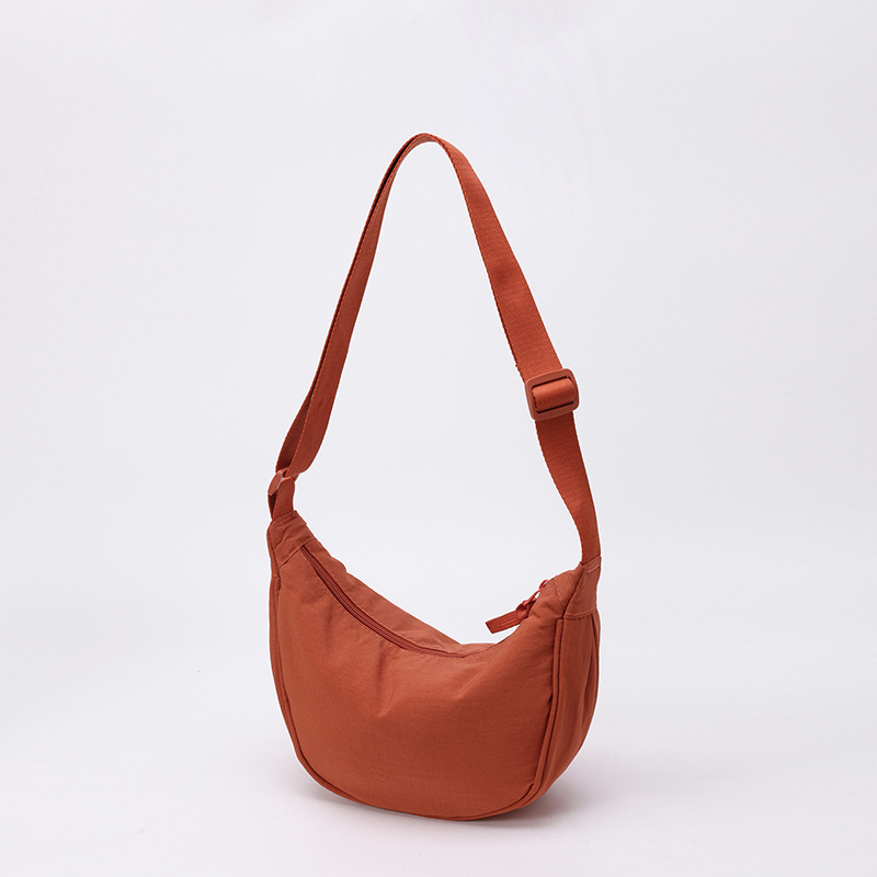 Bolso de tela pequeño bolso de moda ligero bolso de mochila de nylon transfronterizo mujer bolso de hombro casual versátil bolso de bolsas de bolsas de bollo de gran capacidad