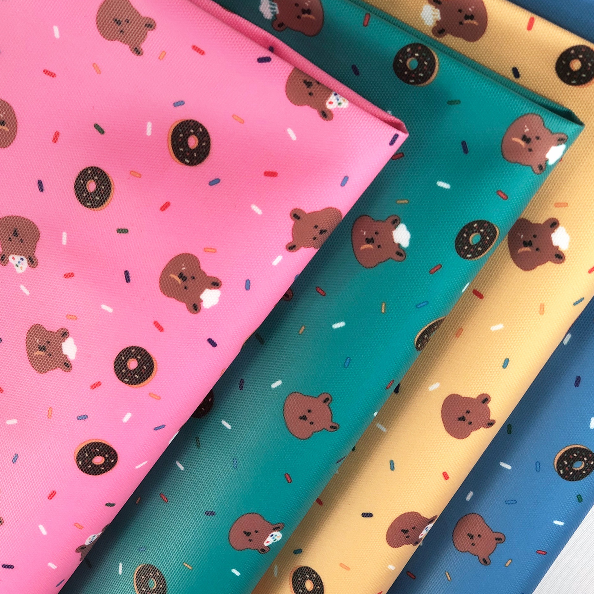 印花皮膜牛津布可爱卡通防水防污箱包饭盒袋保温包洗漱化妆包面料