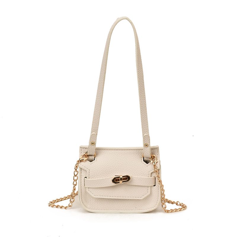 Nuevo bolso de cambio infantil coreano de moda de color sólido mini mochila de bebé comercio exterior accesorios de cadena bolsa de moda