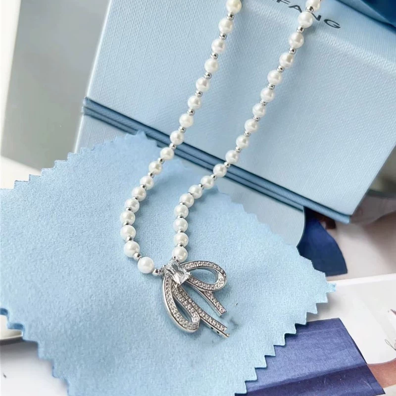 Necklace from pearl with bow, fashionable chain for key bag 