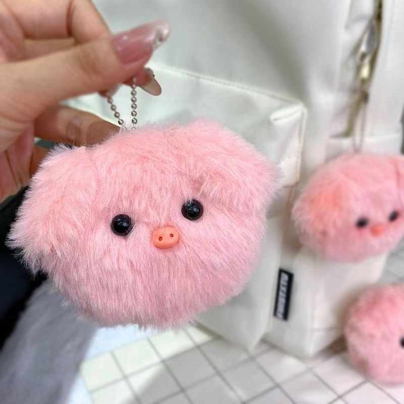 El libro rojo es el mismo tipo de cerdos chillando cerdos lindos bolsos de cerdo en polvo colgante pequeño regalo de muñeca