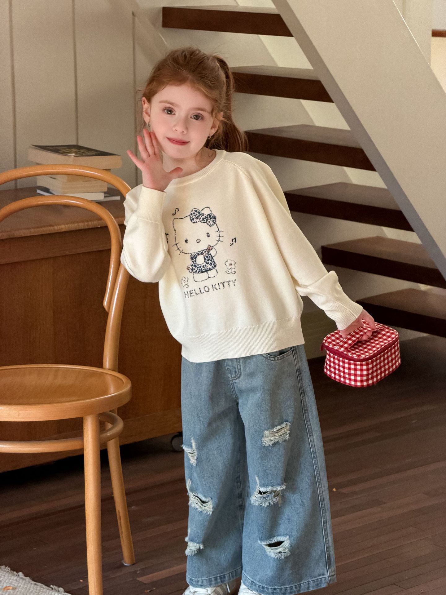 Spring cartoon knitted children's sweater with a round collar