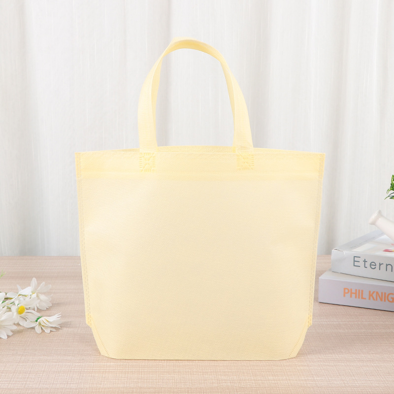 Bolsas de tela no tejida en blanco en stock, bolsas de tela no tejida portátiles, bolsas de prenda, logotipo de impresión image 25