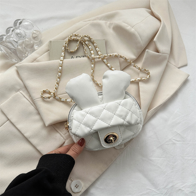 2025 primavera y verano estilo caliente moda casual niños dulces bolsa de gelatina mini bolso de mensajero de un solo hombro variedad al por mayor