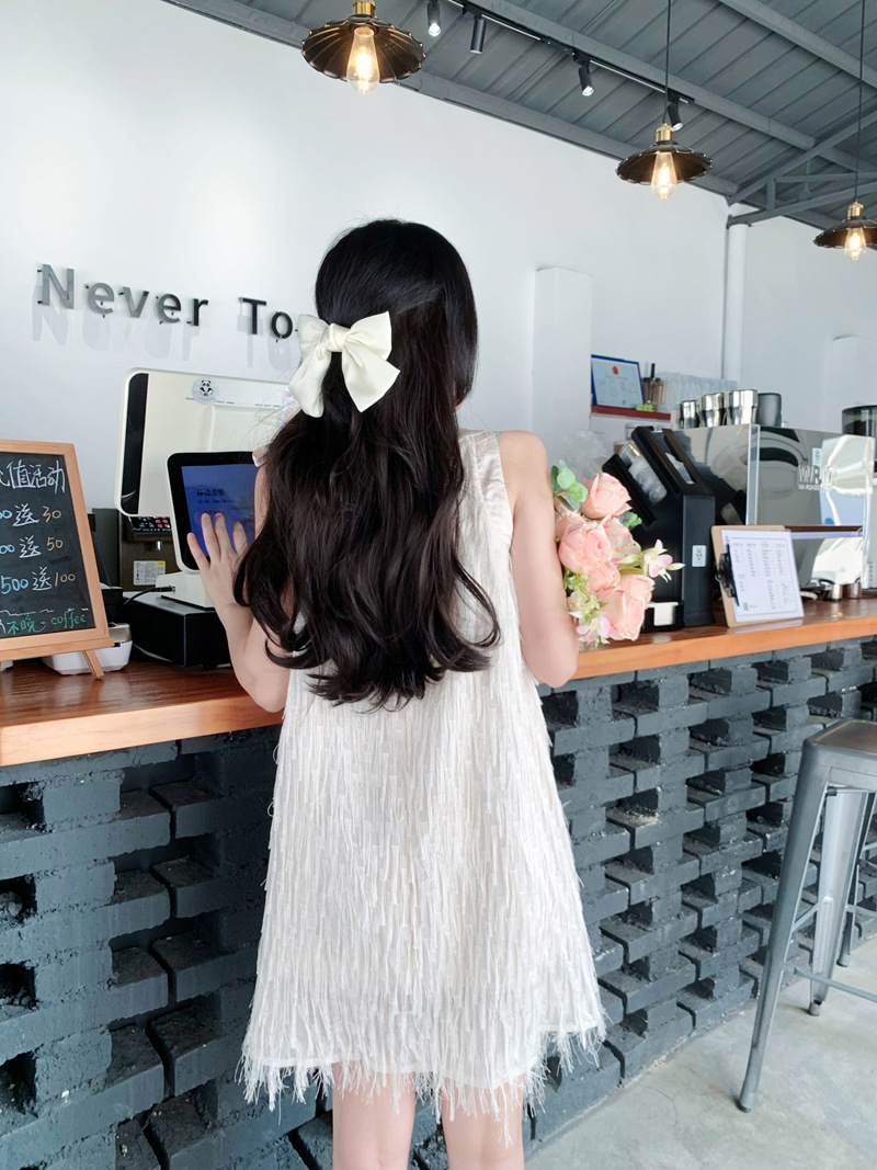 Stylish matching white fringe dresses for mother and daughter