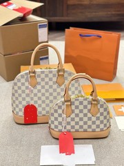 卸売りの外国貿易の商品の供給源のカバンの中号の貝殻のカバンは斜めにシングル肩のハンドバッグにまたがります。