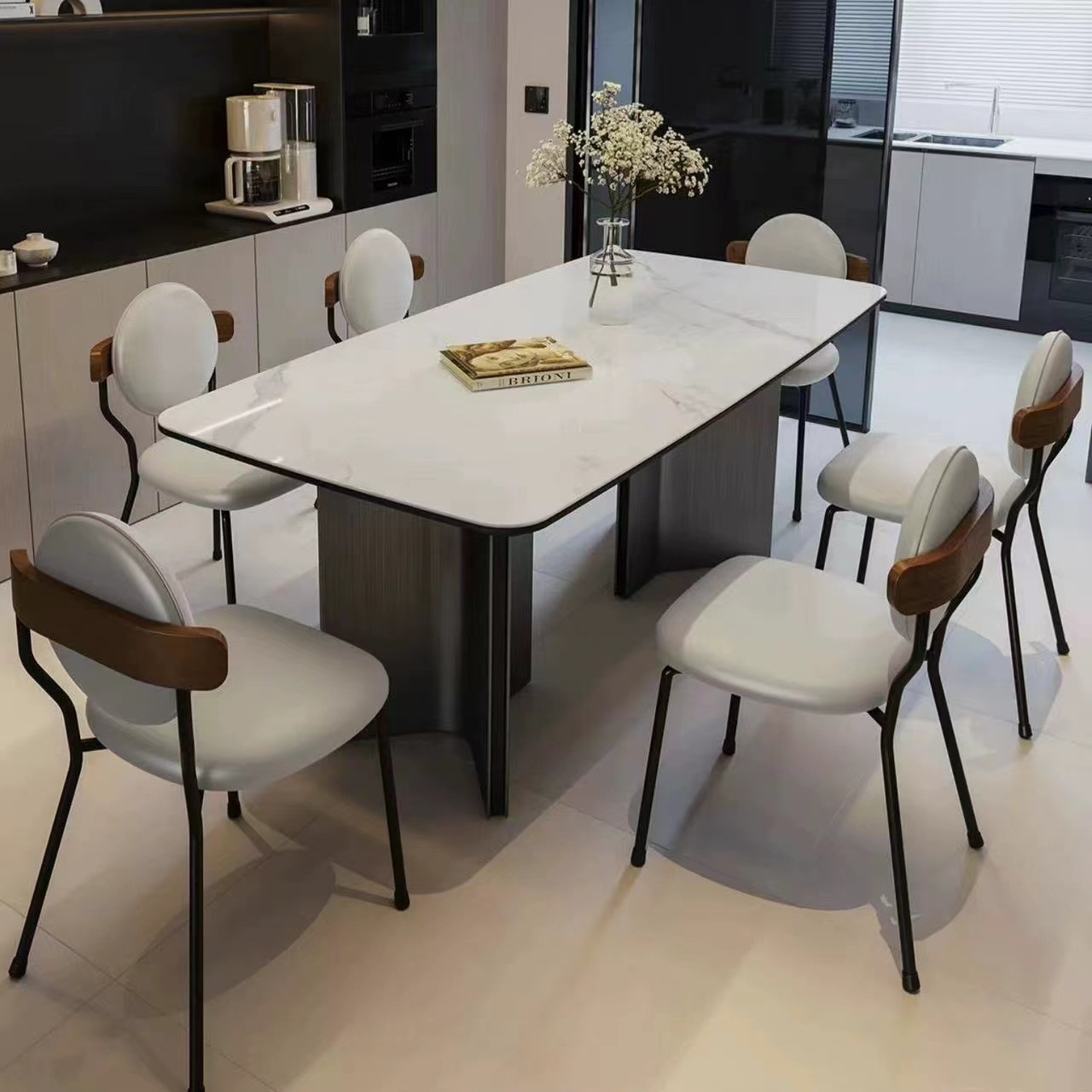 Italiano simple y moderno mesa de comedor de tabla de roca negra combinación rectangular retrógrado pequeño estilo de casa silenciosa mesa de comedor doméstica