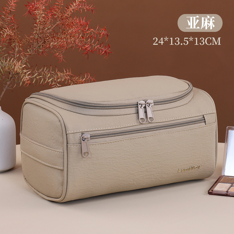 Bolsa de cosméticos portátil transfronteriza, estilo europeo y americano, gran capacidad, almacenamiento impermeable, bolsa de aseo de cuero PU para viaje, bolsa de almacenamiento multifuncional.