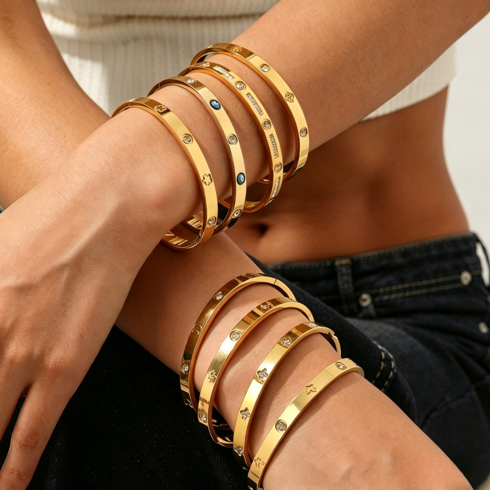 Elegant golden women's bracelet stainless steel