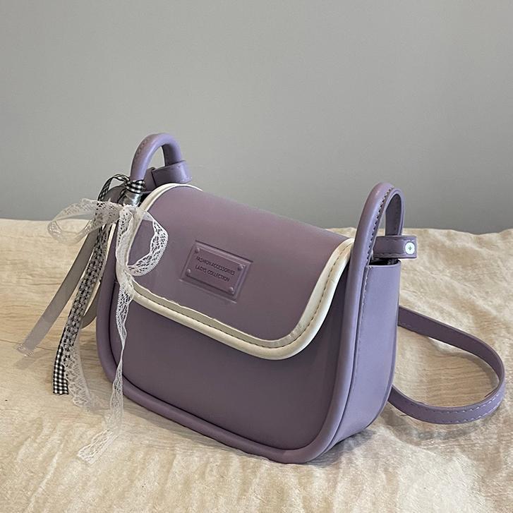 Bolsos de cercanías de nicho de ocio para mujer 2025 nueva primavera y verano bolso de hombro de diseño simple moda bolso de mensajero de todo fósforo