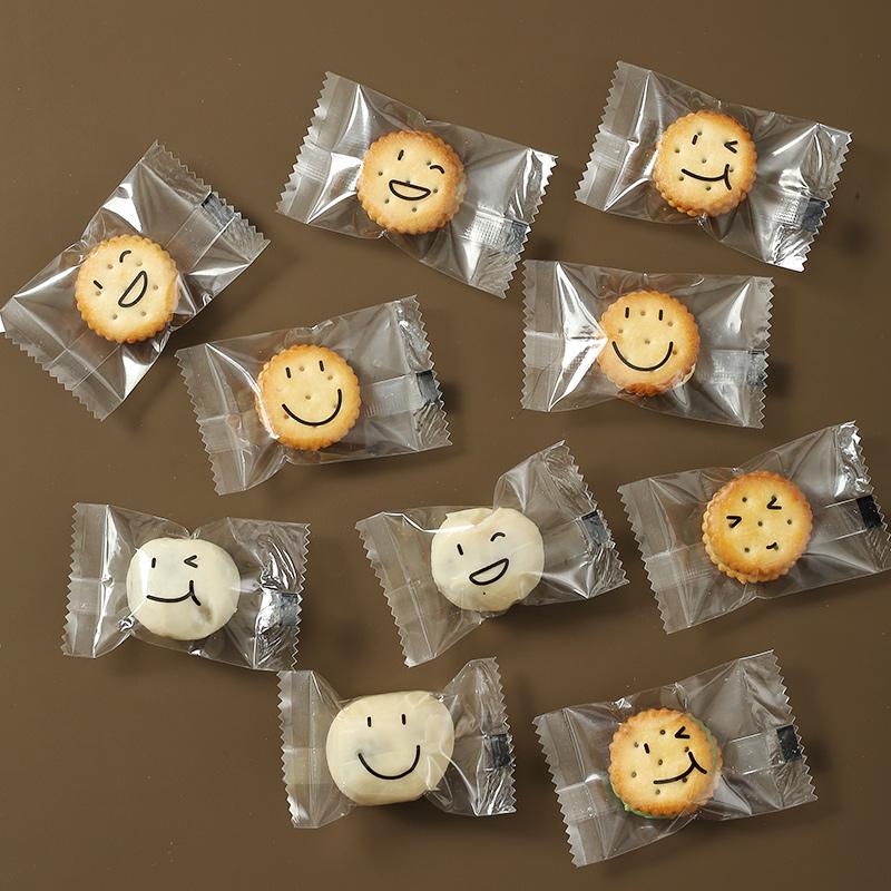 Botón de dibujos animados grueso galletas bolsas transparentes tortilla de nieve nougat horneado galletas de leche datilla sellado mini embalaje