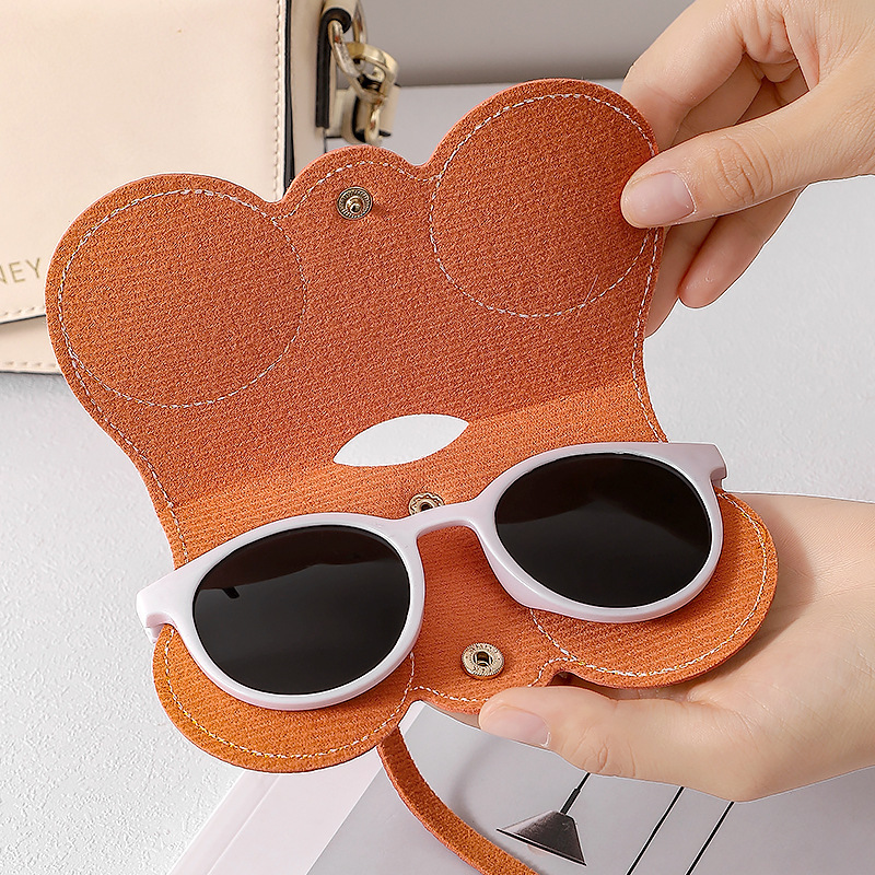 Nuevo paquete de gafas de sol portátiles bolsa de almacenamiento de gafas de sol estuche de gafas con patrón de lichi cuello colgante gafas de cuero cubierta protectora