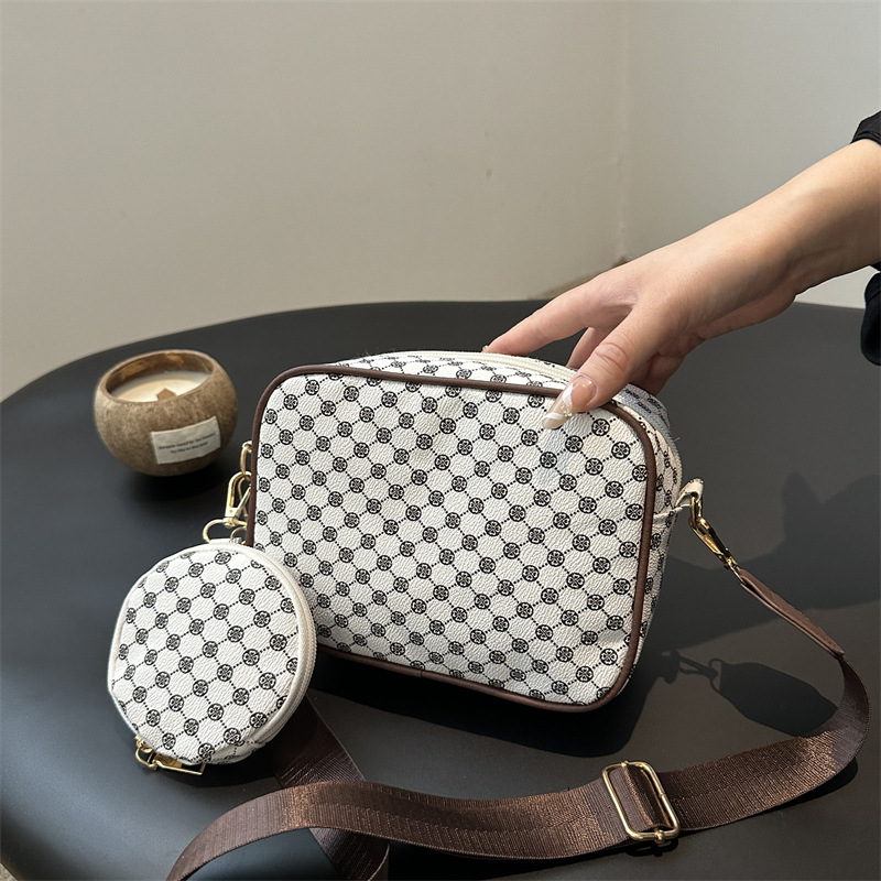 2024 nueva moda simple retro bolso impreso de mujer extranjero ancho cinturón de hombro bolso de hombro casual bolso de mochila