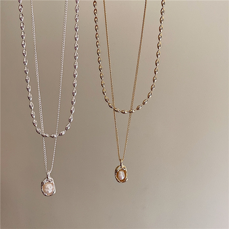 Collana stratificata minimalista con catene delicate gioiello_voghion.com