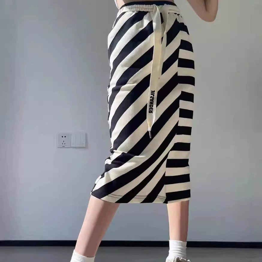 2023 Европейская станция Весна и лето Новый контрастный цвет Нерегулярная полоса на шнурке с высокой талией Элегантная Женская стильная юбка Женская