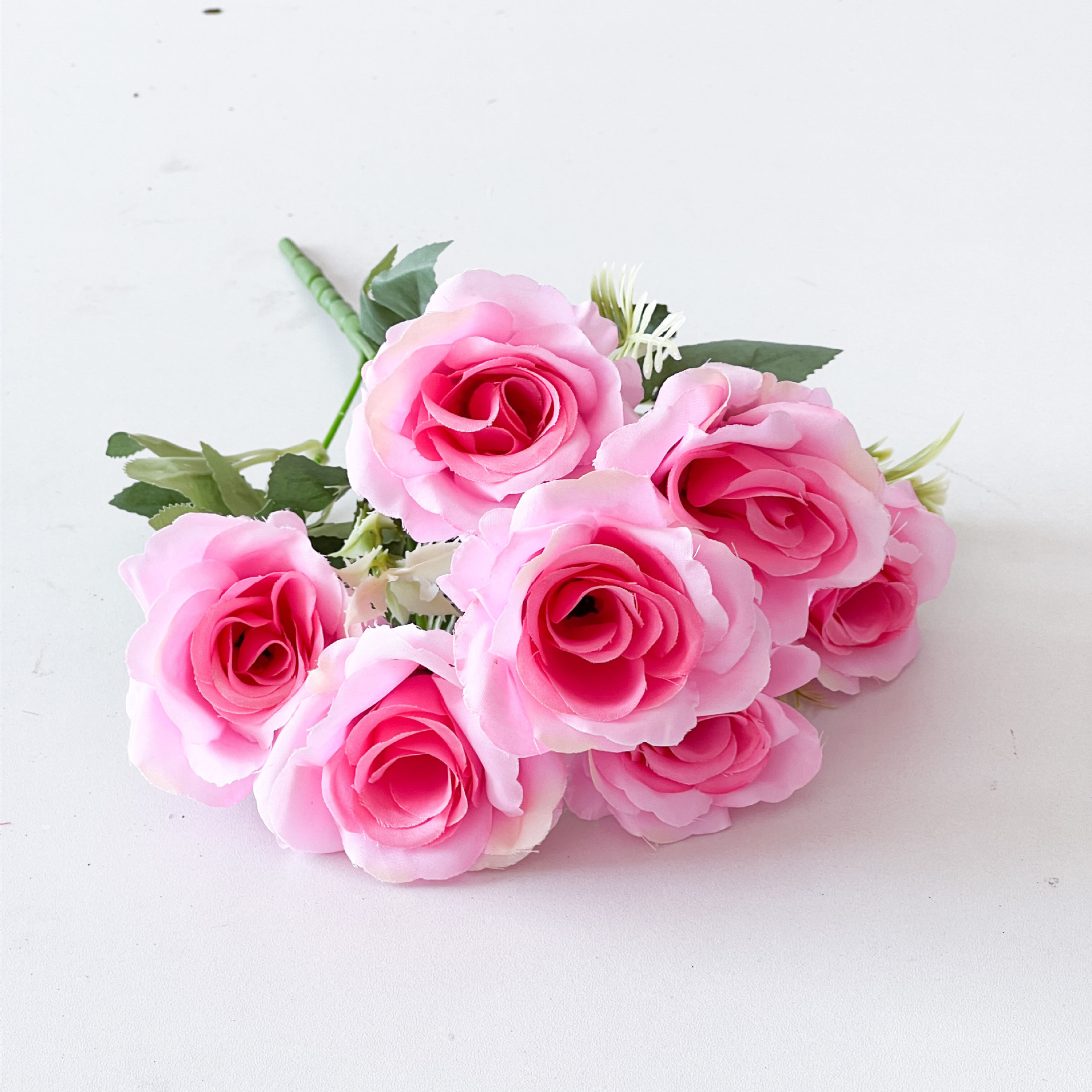 Fábrica al por mayor de estilo europeo 7-cabeza Rosa ramo de flores de seda flor artificial hogar flor decorativa flor falsa flor artificial a prueba real