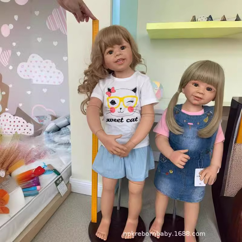 Simulación de ropa modelo muñeca 80 90cm pegamento completo muñeca conjunta 1-3 años de edad modelo de ropa para niños